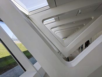 High angle view of people on escalator in building