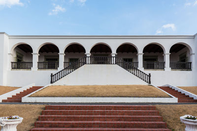 Low angle view of white building against sky