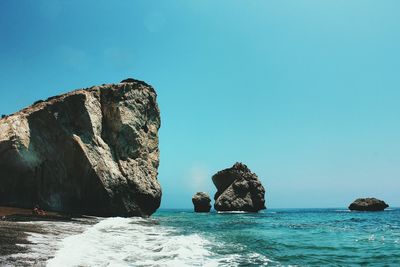 Scenic view of sea against clear blue sky