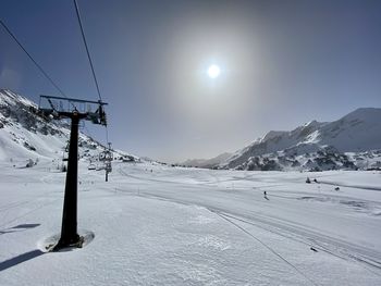 Scenic view of snow covered mountains from the ski lift