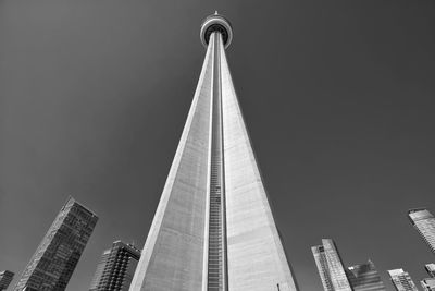 Low angle view of cn tower against sky in city