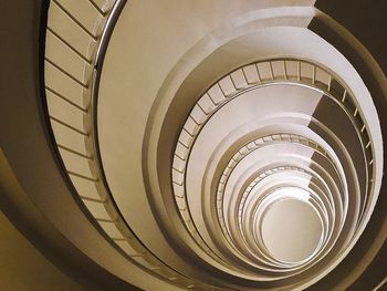 Low angle view of spiral staircase in building