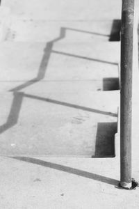 Close-up of shadow on tiled floor