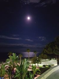 Scenic view of sea against sky at night