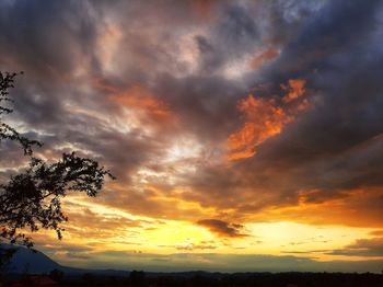 Scenic view of dramatic sky during sunset