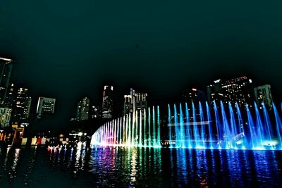 View of illuminated city at night