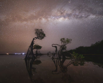 Scenic view of sea against sky at night