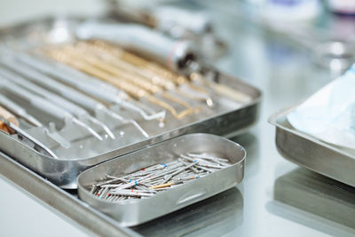 Close-up of dental equipment on table