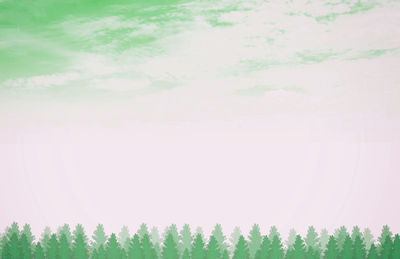 Digital composite image of trees on field against sky