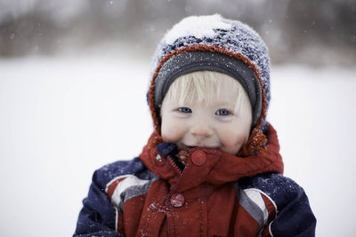 Portrait of cute boy during winter