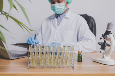 Portrait of young woman working in laboratory