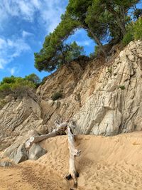 Rock formation on land against sky