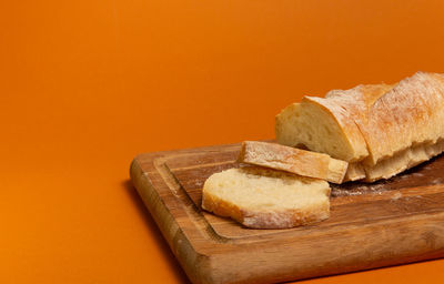 Close-up of bread on cutting board