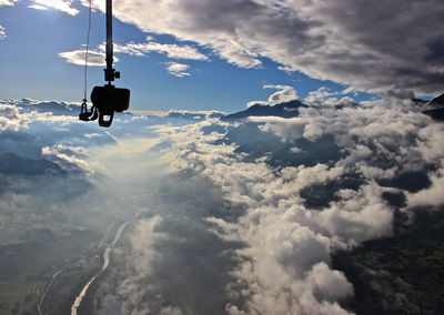 High angle view of person paragliding against sky