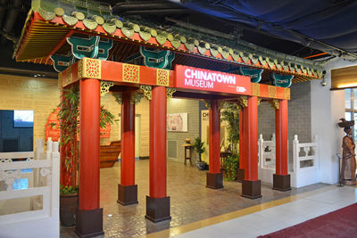 Entrance of temple against building