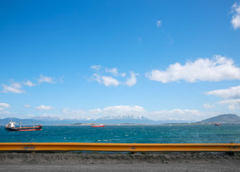 Scenic view of sea against blue sky