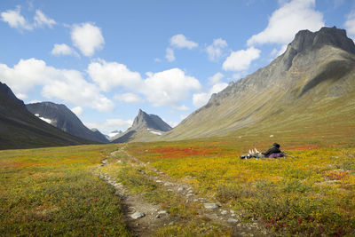 Couple resting in mountains