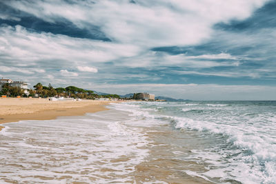 Scenic view of beach against sky