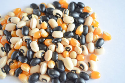 High angle view of various beans on table