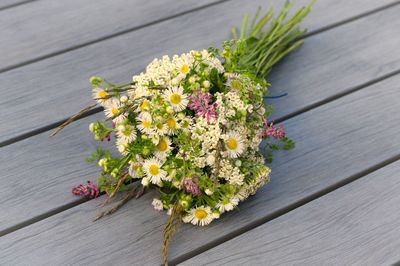 Close-up of white flowers on table
