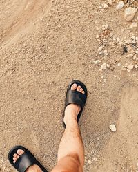 Sandals on the summer beach sand