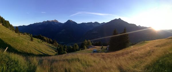 Panoramic view of mountains against sky during sunset