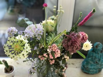 Close-up of purple flowering plant in vase