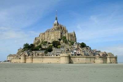 View of temple building against sky