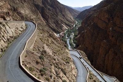 High angle view of road amidst mountains