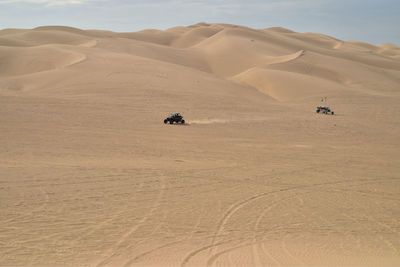 Vehicle moving on desert