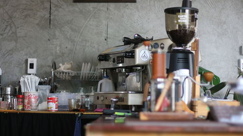 High angle view of coffee and vegetables in kitchen