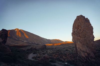 Scenic view of mountains against clear sky