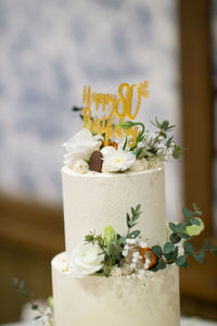 Close-up of white roses on table