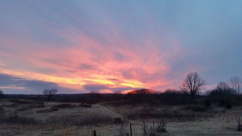 Scenic view of landscape against sky during sunset