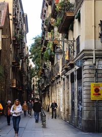 People walking on street in city