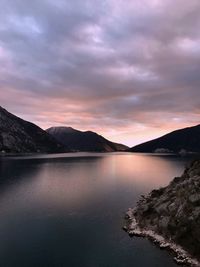 Scenic view of lake against sky during sunset