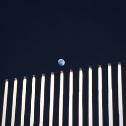 Close-up of moon over black background