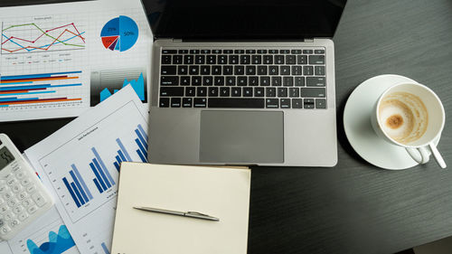 High angle view of coffee cup on table