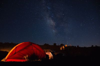 Tent against sky at night