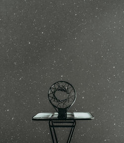 Low angle view of basketball hoop against wall