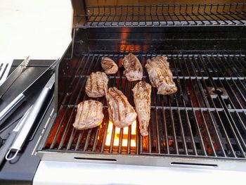 Close-up of meat on barbecue grill