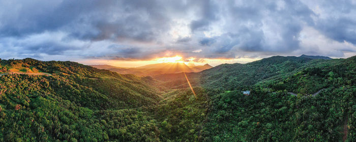 Scenic view of landscape against sky during sunset