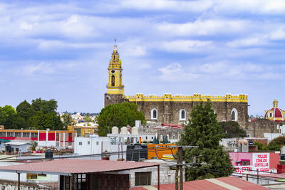 Buildings against sky in city