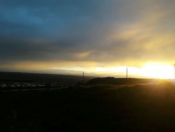 Scenic view of sea against dramatic sky