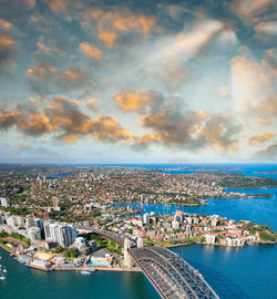 High angle view of sea and buildings against sky