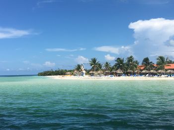 Scenic view of sea against cloudy sky