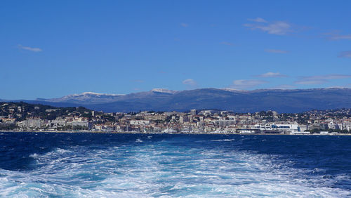 Scenic view of sea against blue sky