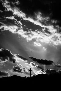 Scenic view of landscape against cloudy sky