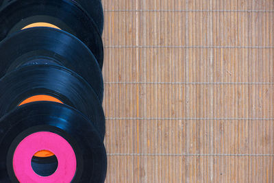 Directly above shot of records on mat