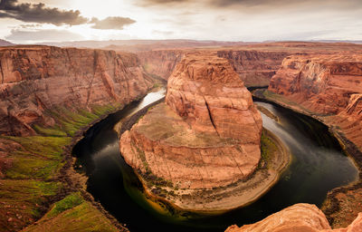 Scenic view of horseshoe bend during sunset